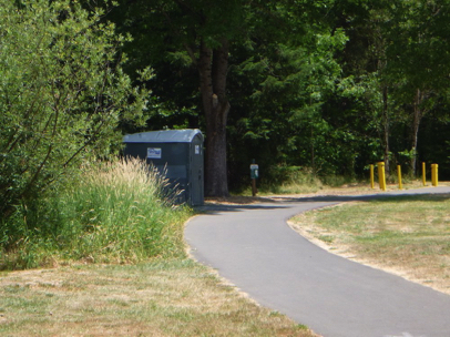 Accessible porta potty along the trail